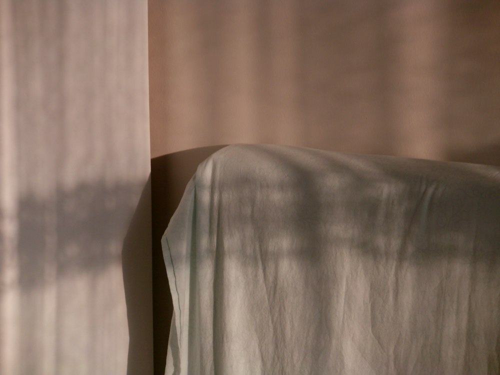 Morning light falling across linen